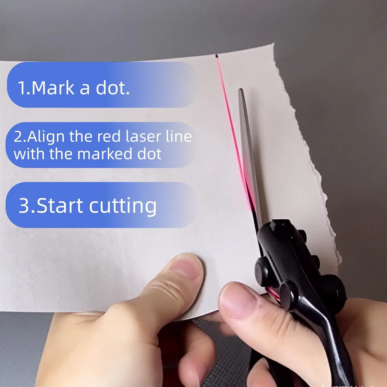 Laser guided scissors cutting straight with red laser