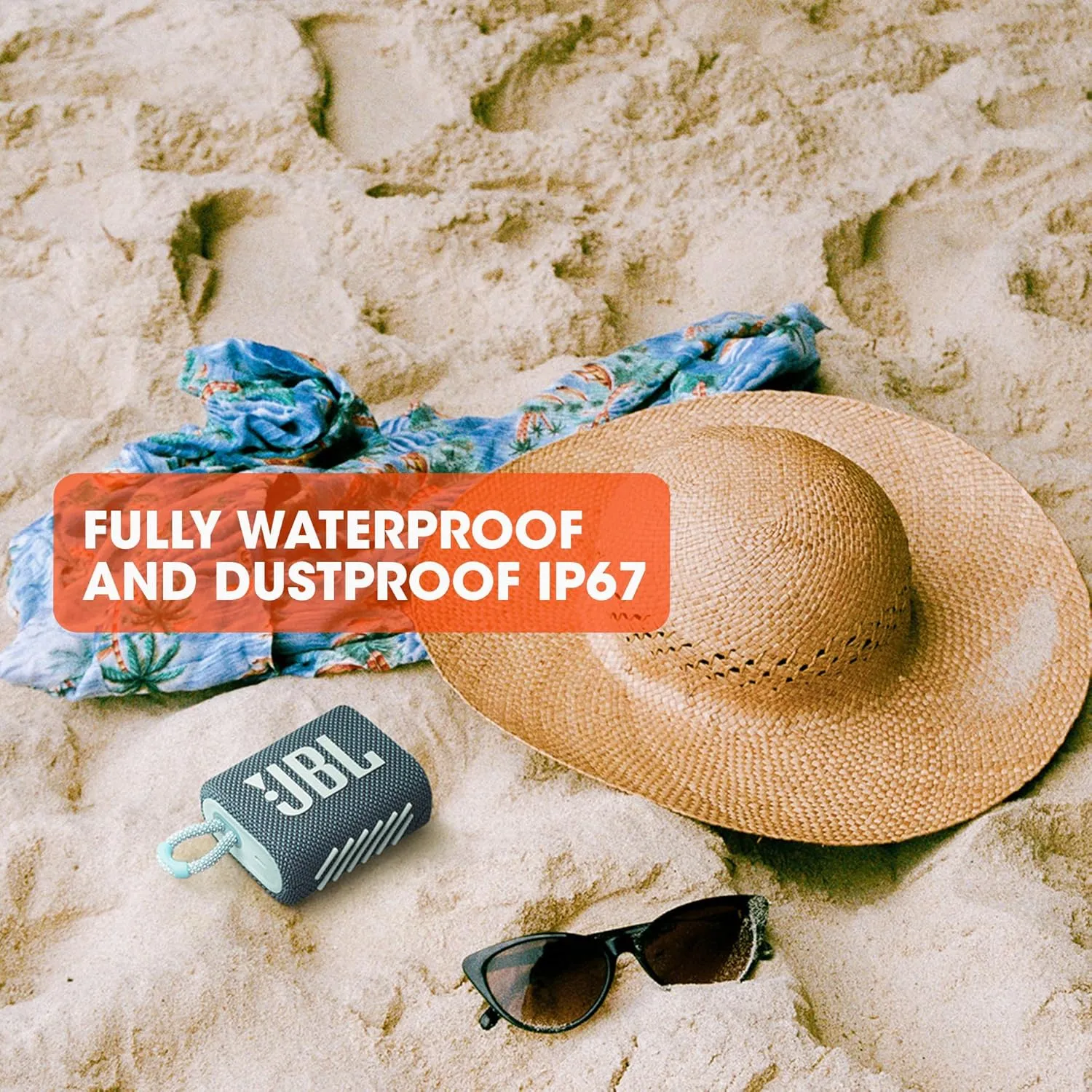 JBL Go 3 fully waterproof and dustproof IP67 speaker on beach sand