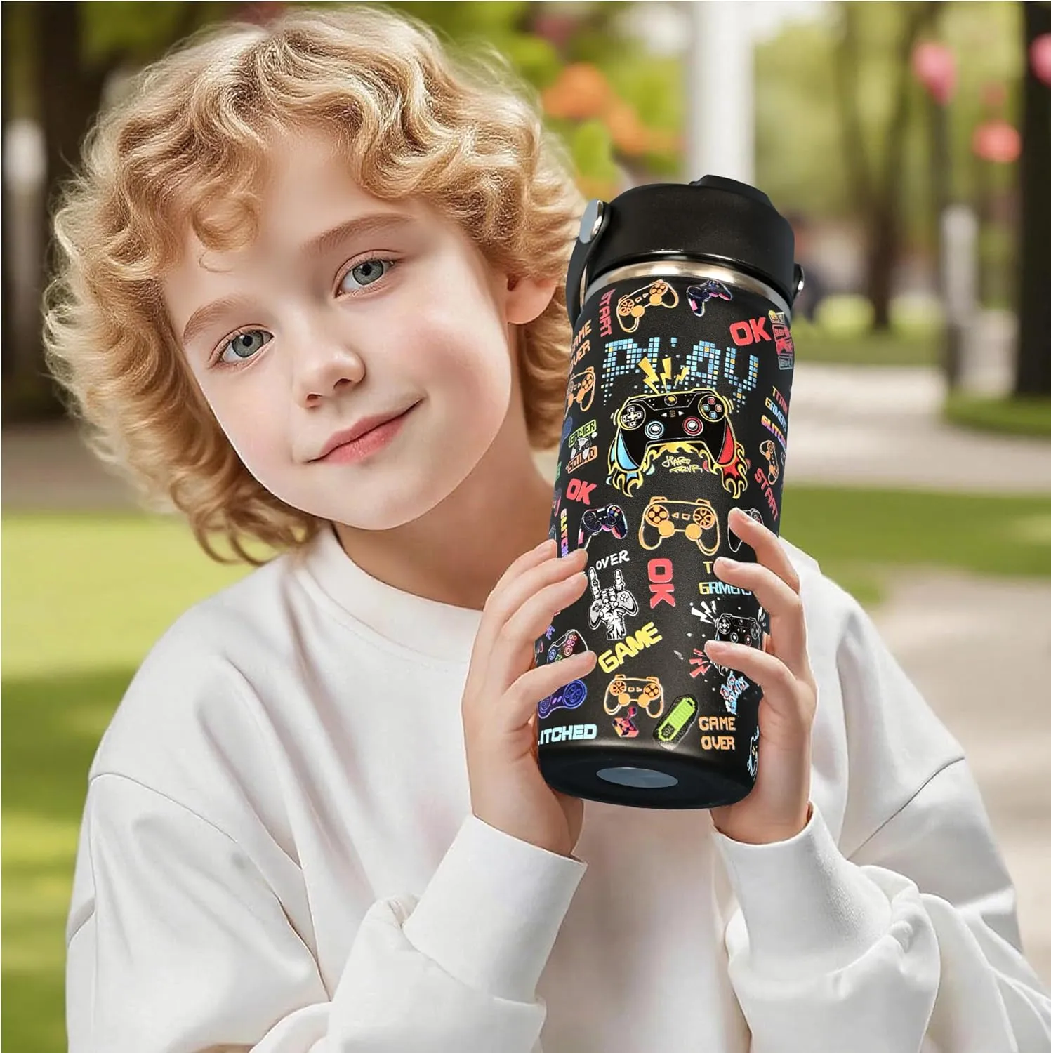 Child holding gamer insulated water bottle outdoors