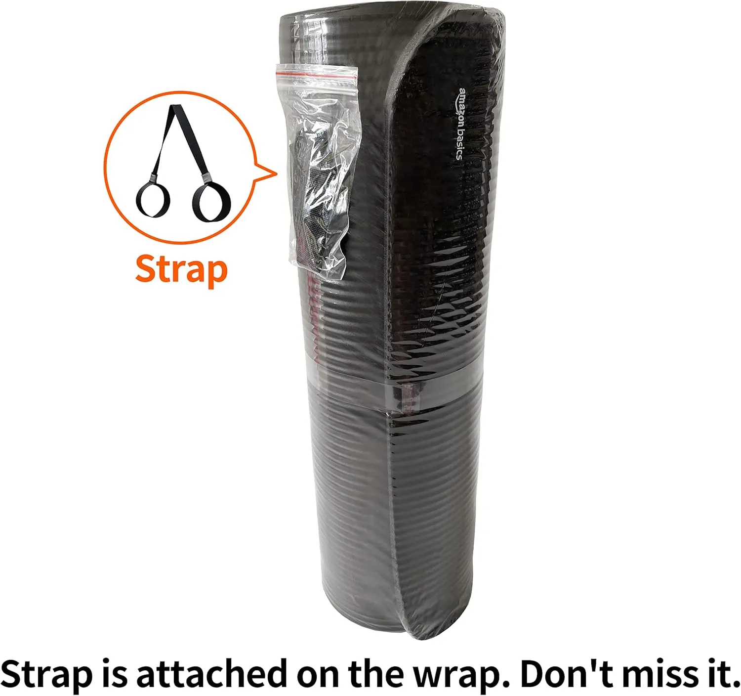 Woman using the black exercise yoga mat during a floor stretch at home.
